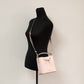 Suri Small Dark Powder Blush Signature PVC Bucket Crossbody Handbag - SEHABRANDS